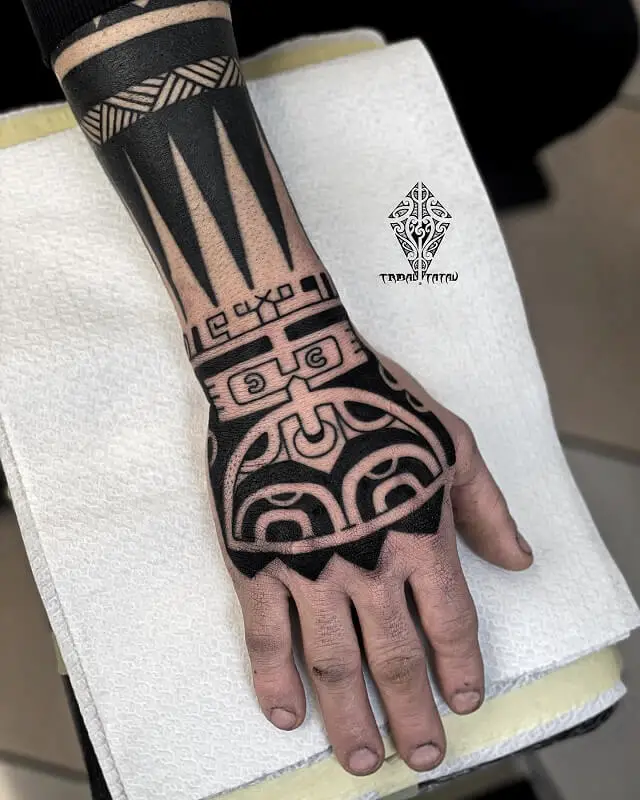 tribal hand tattoos