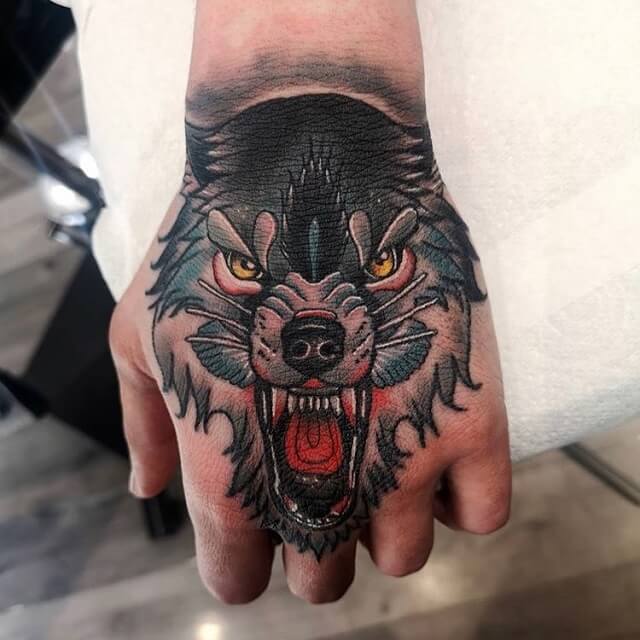 wolf hand tattoos