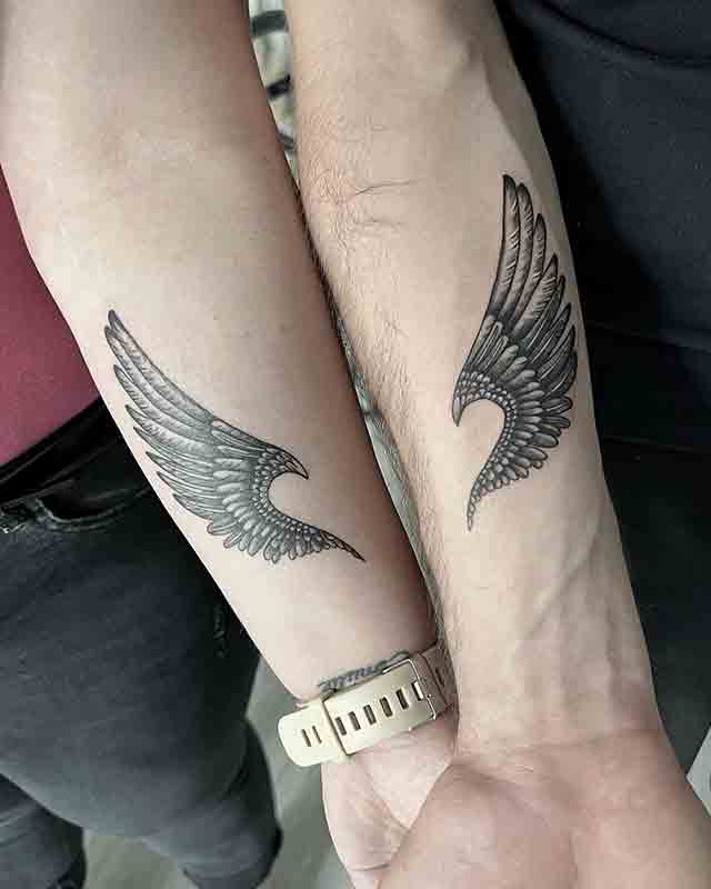 angel wings tattoo on arm