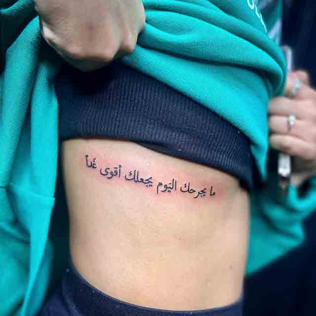 Arabic-Tattoos-on-ribs-(2)