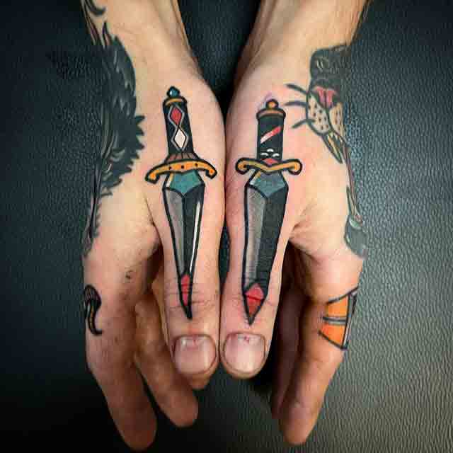 Daggers-Tattoos-In-A-Finger-For-Woman-(2)