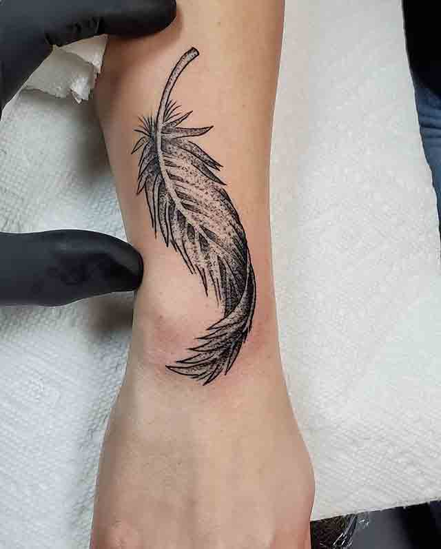 Feather-Tattoo-On-Hand-(1)