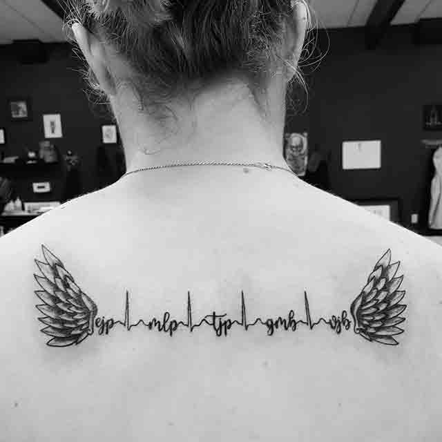 Female-Angel-Wings-Tattoo-On-Back-(1)