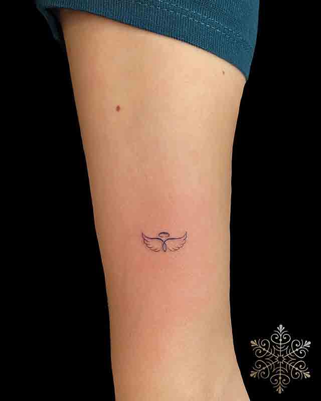 Minimalist-Angel-Wings-Tattoo-(3)