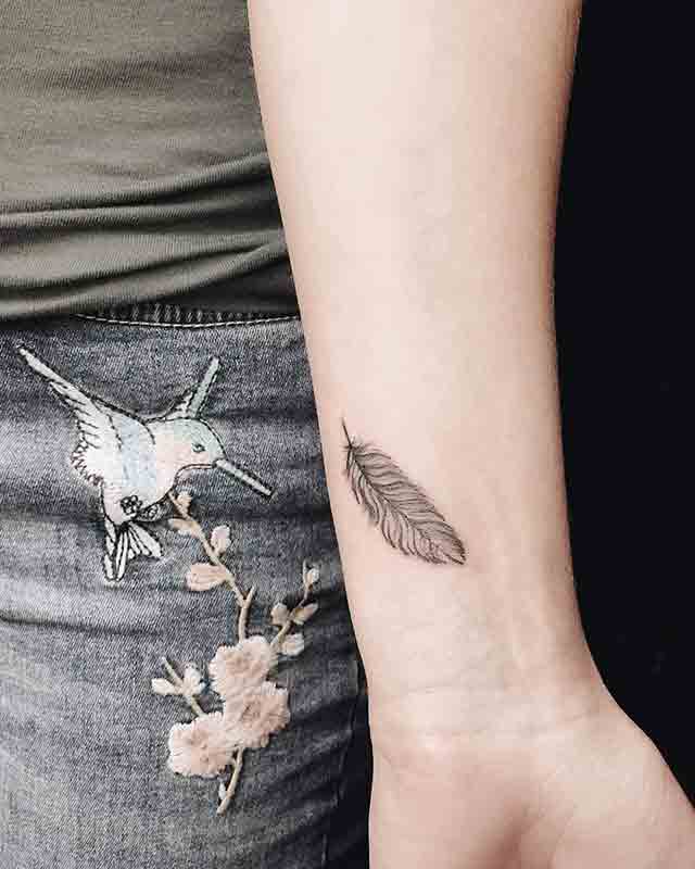 Little feather tattoo  Miguel Angel Custom Tattoo Artist ww  Flickr