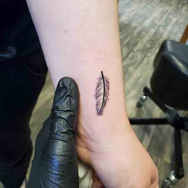 Lovely Feather Tattoo On Finger  Tattoo Designs Tattoo Pictures