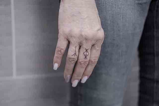 Tiny-Finger-Tattoos-For-Women-(2)