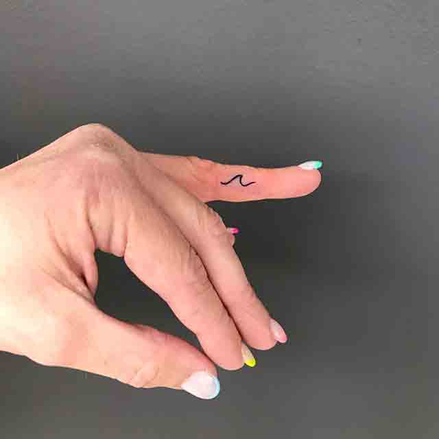 finger tattoos words for girls