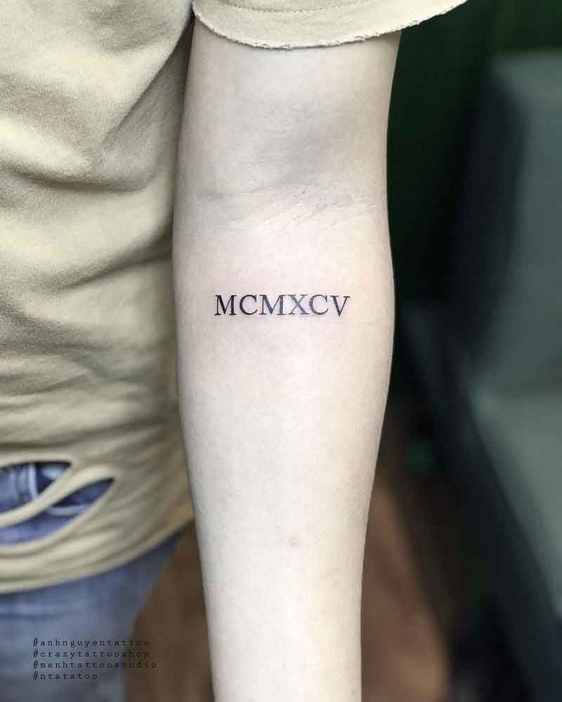 1995 Roman Numerals Tattoo 1