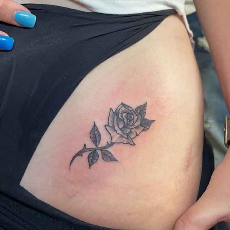 Black Rose Hip Tattoo 1