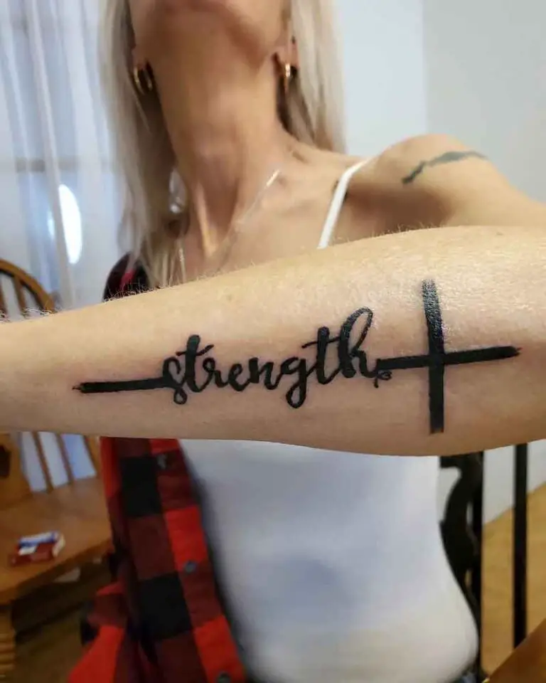 76 Meaningful Strength Tattoo Ideas You Need To See Cross Strength Tattoo 1 768x960
