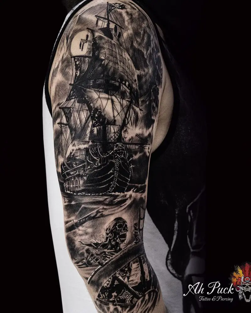 Realistic Grey Ink Pirate Tattoo On Half Sleeve