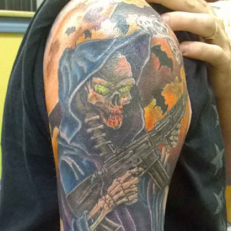 Grim Reaper Holding Gun Tatoo 2