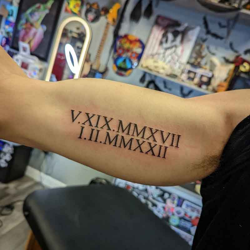 Roman Numeral Bicep Tattoo 3