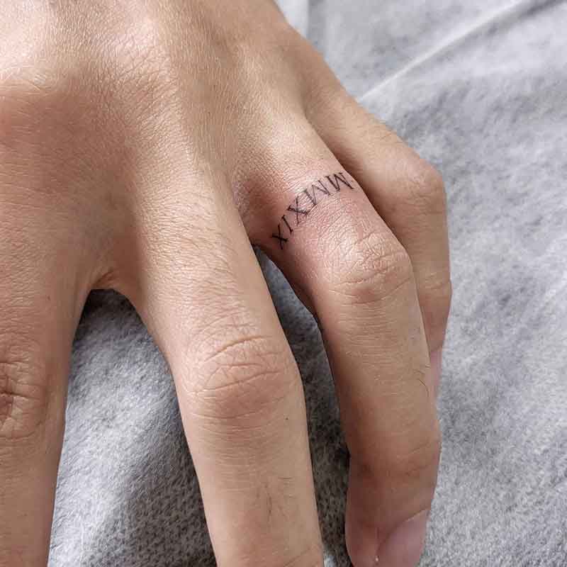 Roman Numeral Ring Tattoo 3
