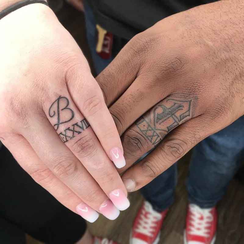 Roman Numeral Tattoo On Finger 3