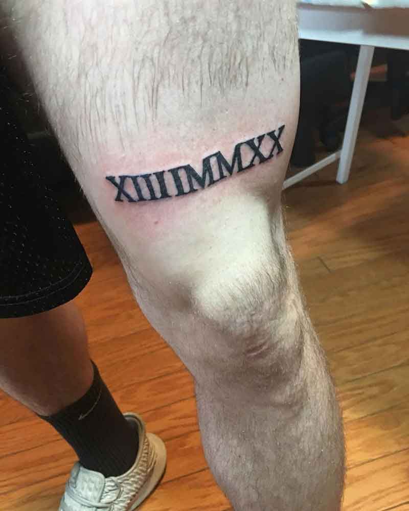 Roman Numeral Thigh Tattoo 2