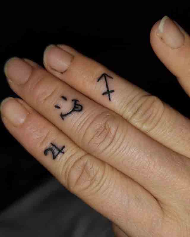 Sagittarius-Finger-Tattoo-(1)