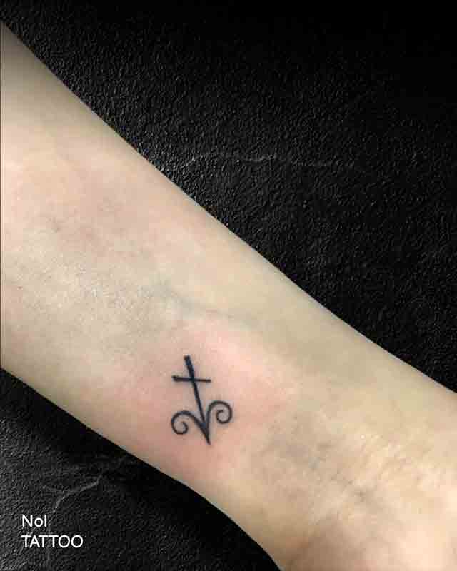 Sagittarius-Tattoo-On-Wrist-(1)