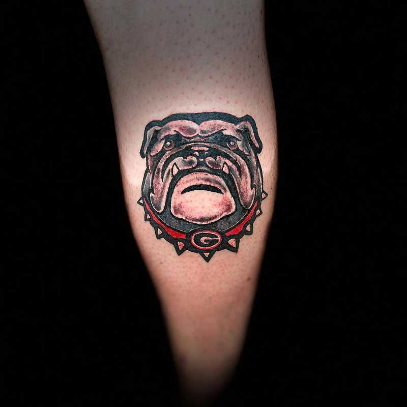 Tattoo uploaded by Joanie Schugardt  Georgia bulldog in the shape of  Georgia on the back  Tattoodo
