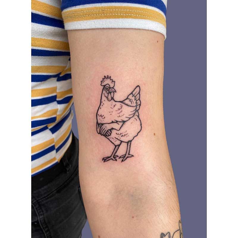 A donut and a piece of fried chicken tattoo by Chinatown Stropky   Tattoogridnet