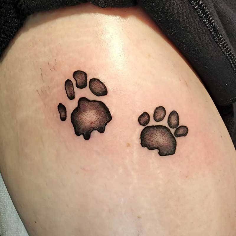 minimalist-tiny-paw-print-tattoo-2
