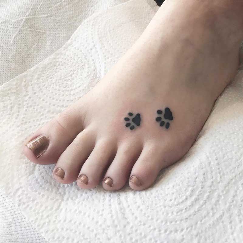 paw-print-tattoo-on-bottom-of-toe-3