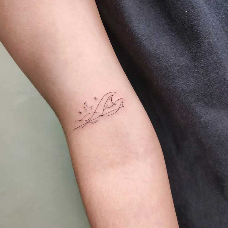 30 Tiny Tattoo Design Ideas for 2023  The Trend Spotter