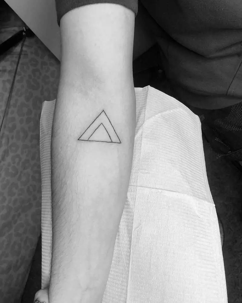 What the Triangle Tattoo Symbolizes An Overview of Hipster Triangle Tattoo  Meaning  Impeccable Nest