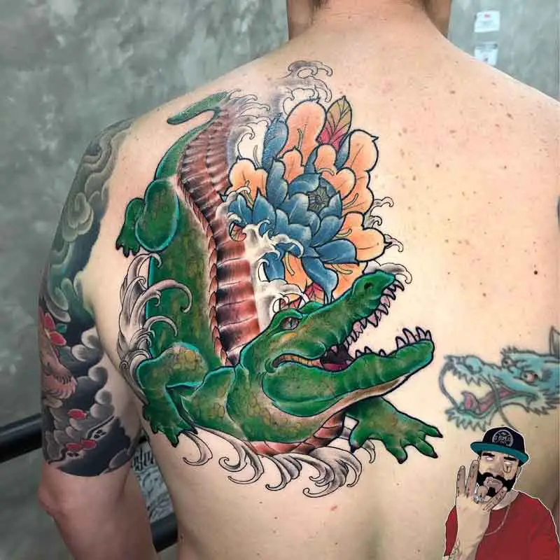 Unique Colorful Alligator With Flowers And Butterflies Tattoo On Girl Left  Back Shoulder