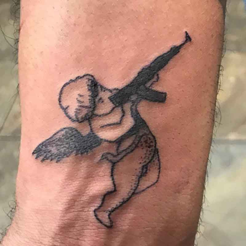 Details 81 cupid angel with gun tattoo latest  thtantai2