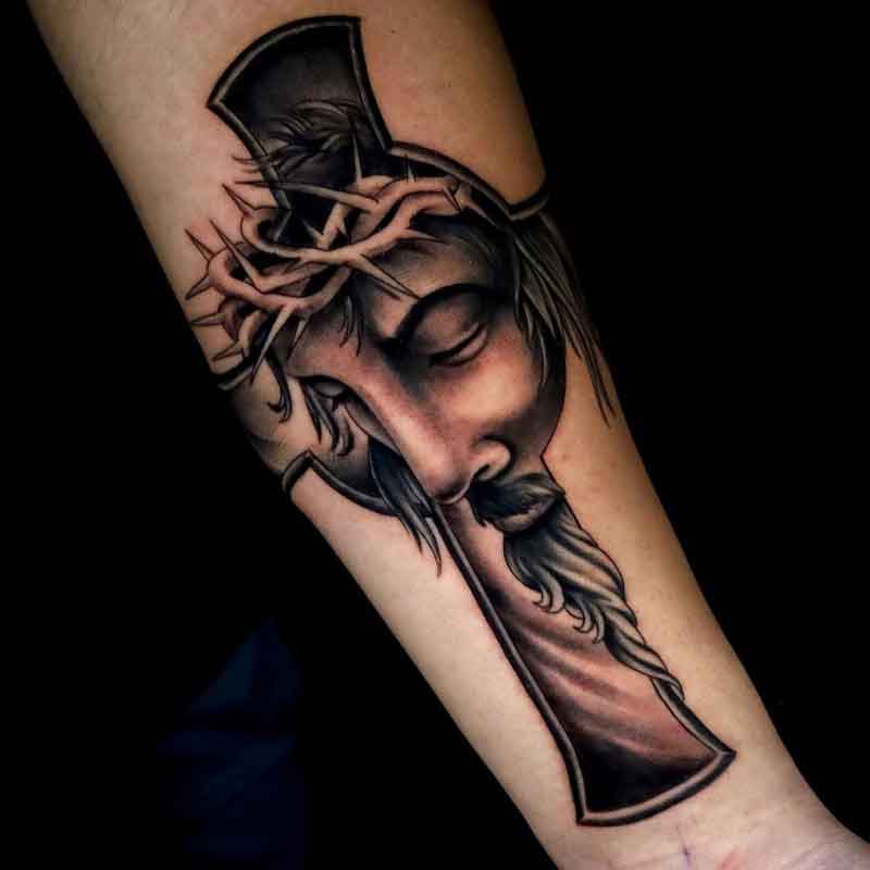 jesus cross tattoo arm