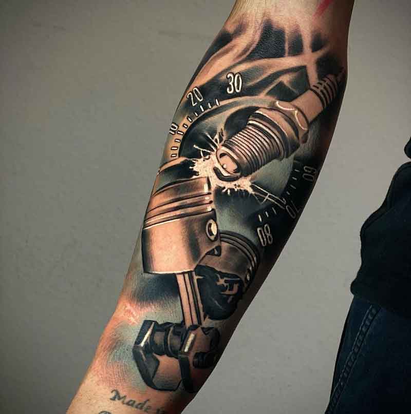 Traditional style motorbike tattoo on the inner arm