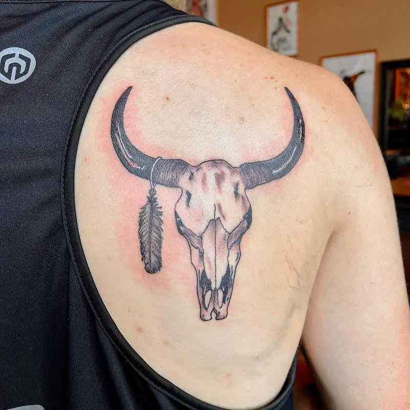 bull-skull-feathers-tattoo-2