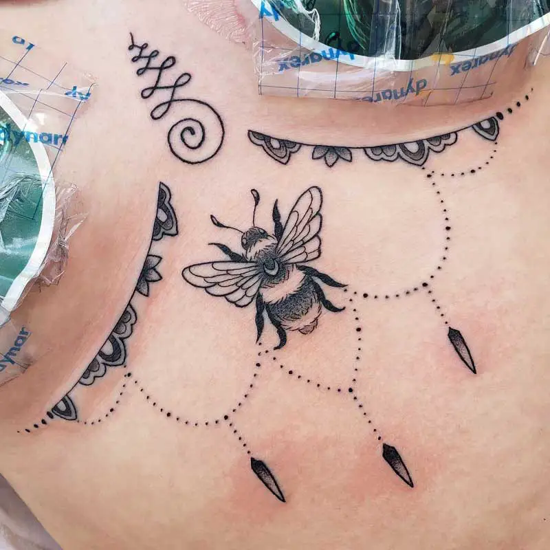 bumble-bee-sternum-tattoo-2