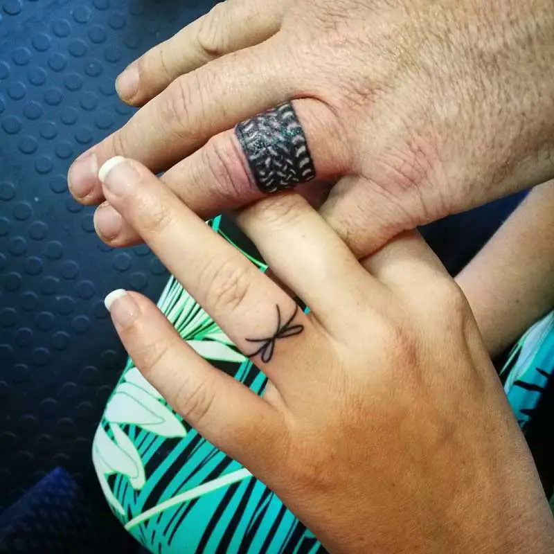 42 Wedding Ring Tattoos That Will Only Appeal To The Most Amazing Of  Couples  TattooBlend