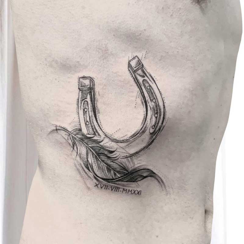 feather-horseshoe-tattoo-3