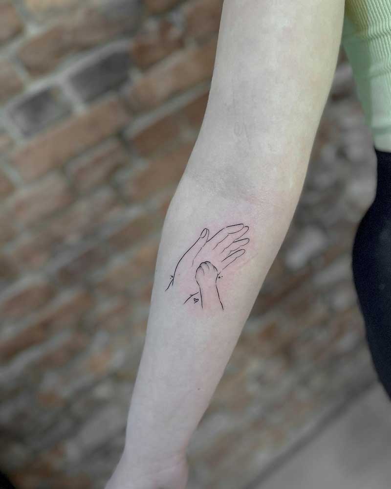 hand-holding-dog-paw-tattoo--3