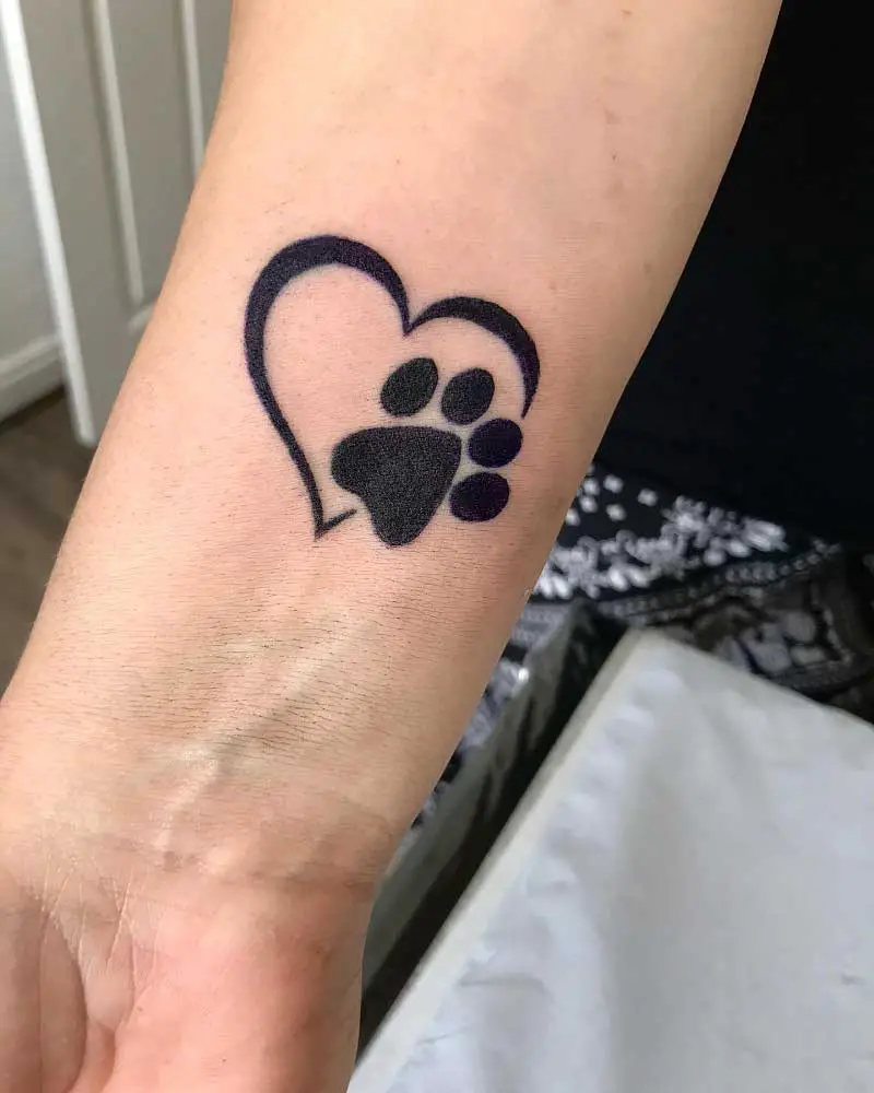 dog paw print tattoo on wrist