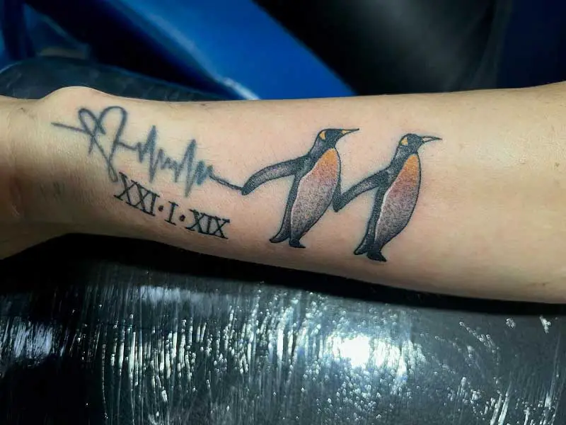 90 Super Cute Penguin Tattoo Designs and Ideas 