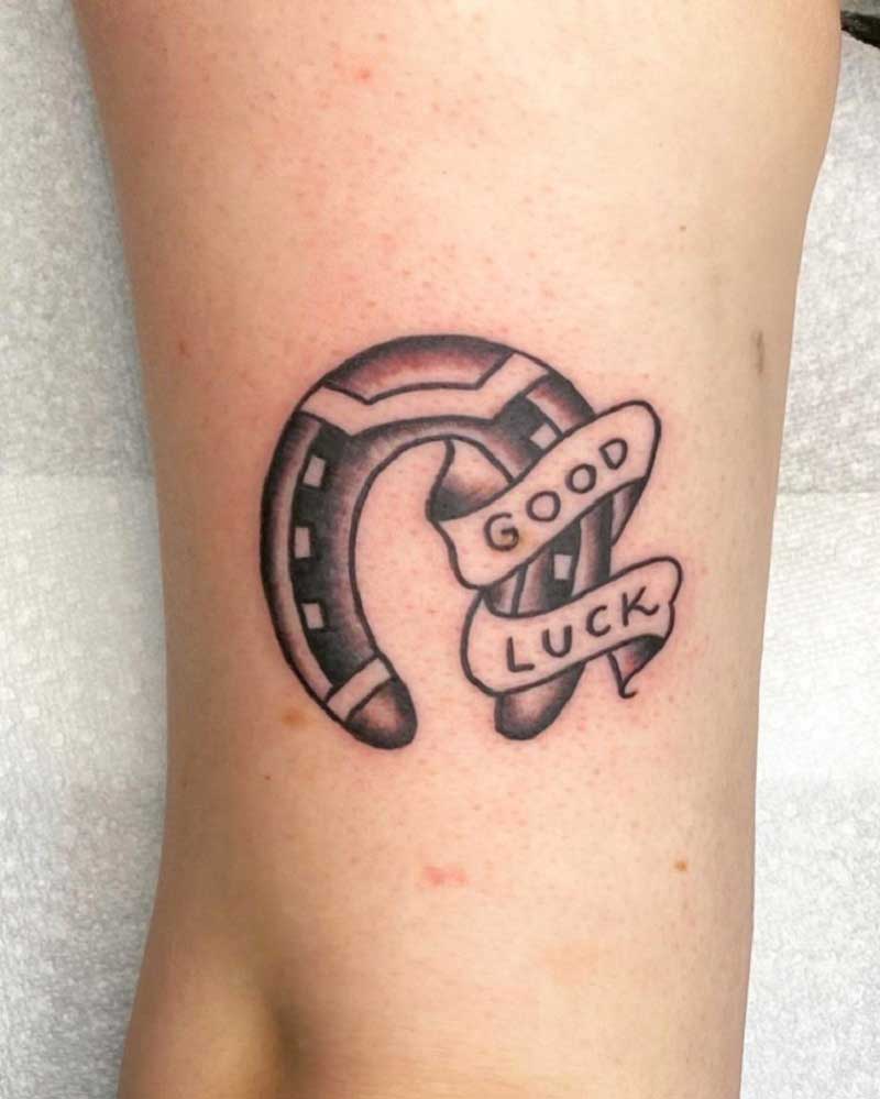 upside-down-horseshoe-tattoo-3