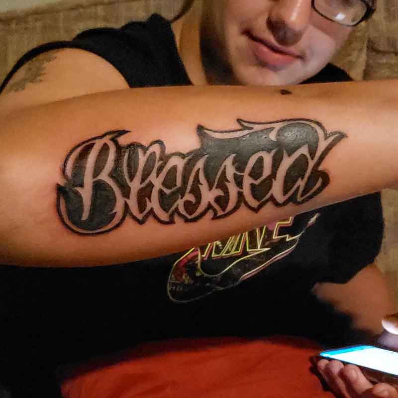 Cursive Negative Space Lettering Tattoo 3