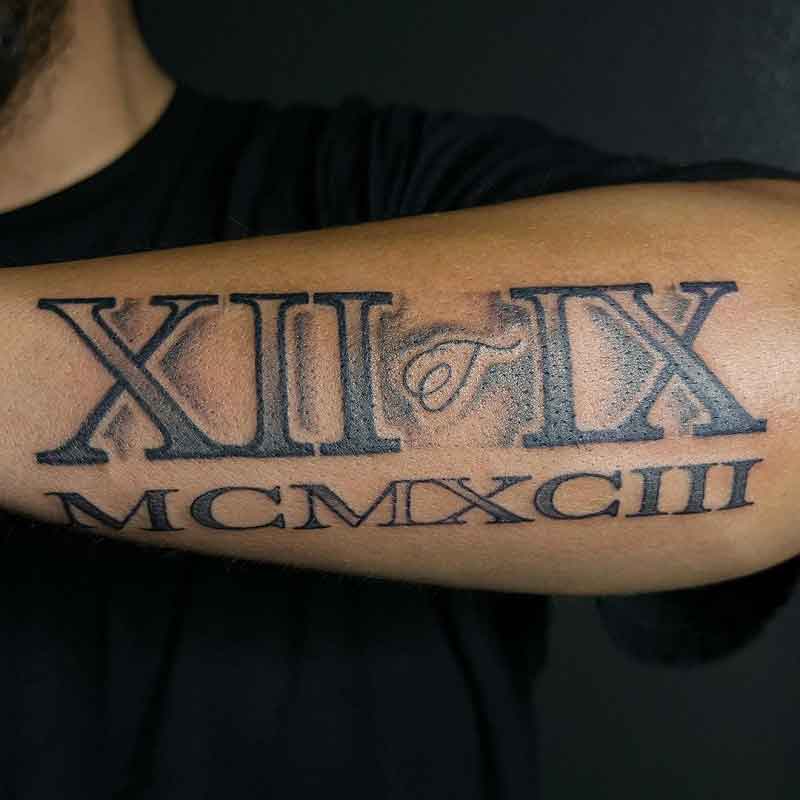 Negative Space Roman Numeral Tattoo 1