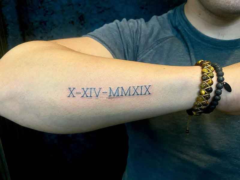 Roman Numeral Cover Up Tattoo 3