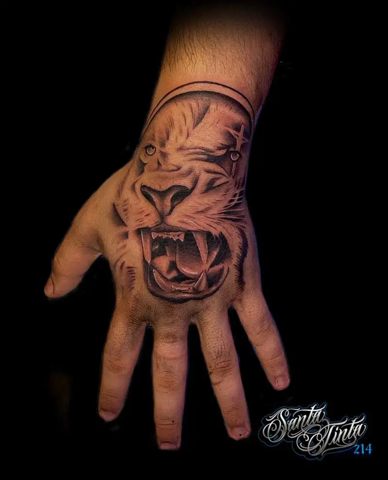 angry-lion-hand-tattoo-1