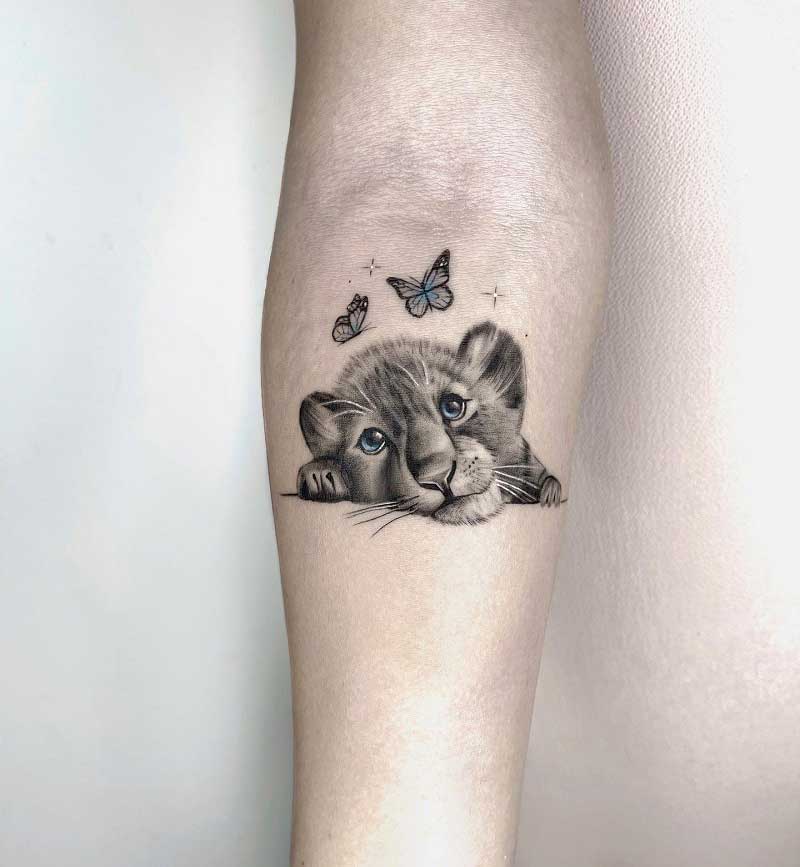 baby-lion-hand-tattoo-2