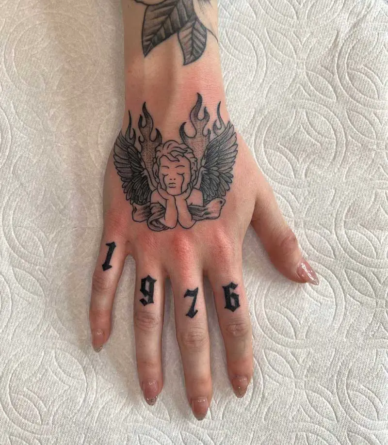 cherub-hand-tattoo-3