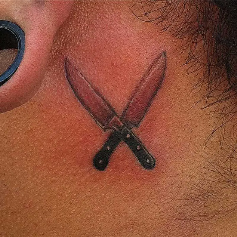 cross-knife-tattoo-2