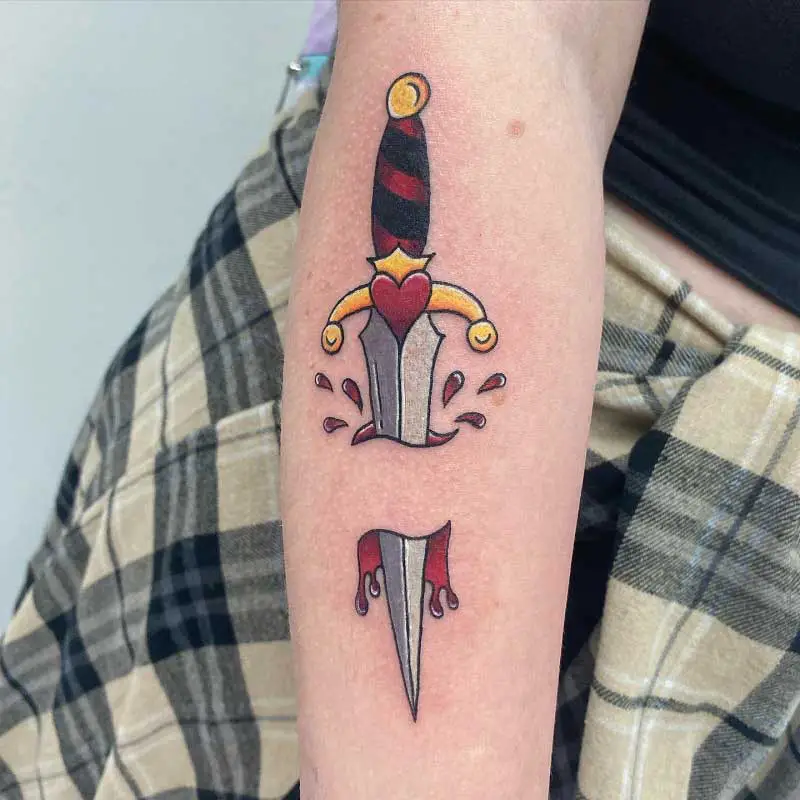 knife-through-skin-tattoo-2