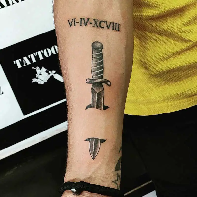 knife-through-skin-tattoo-3